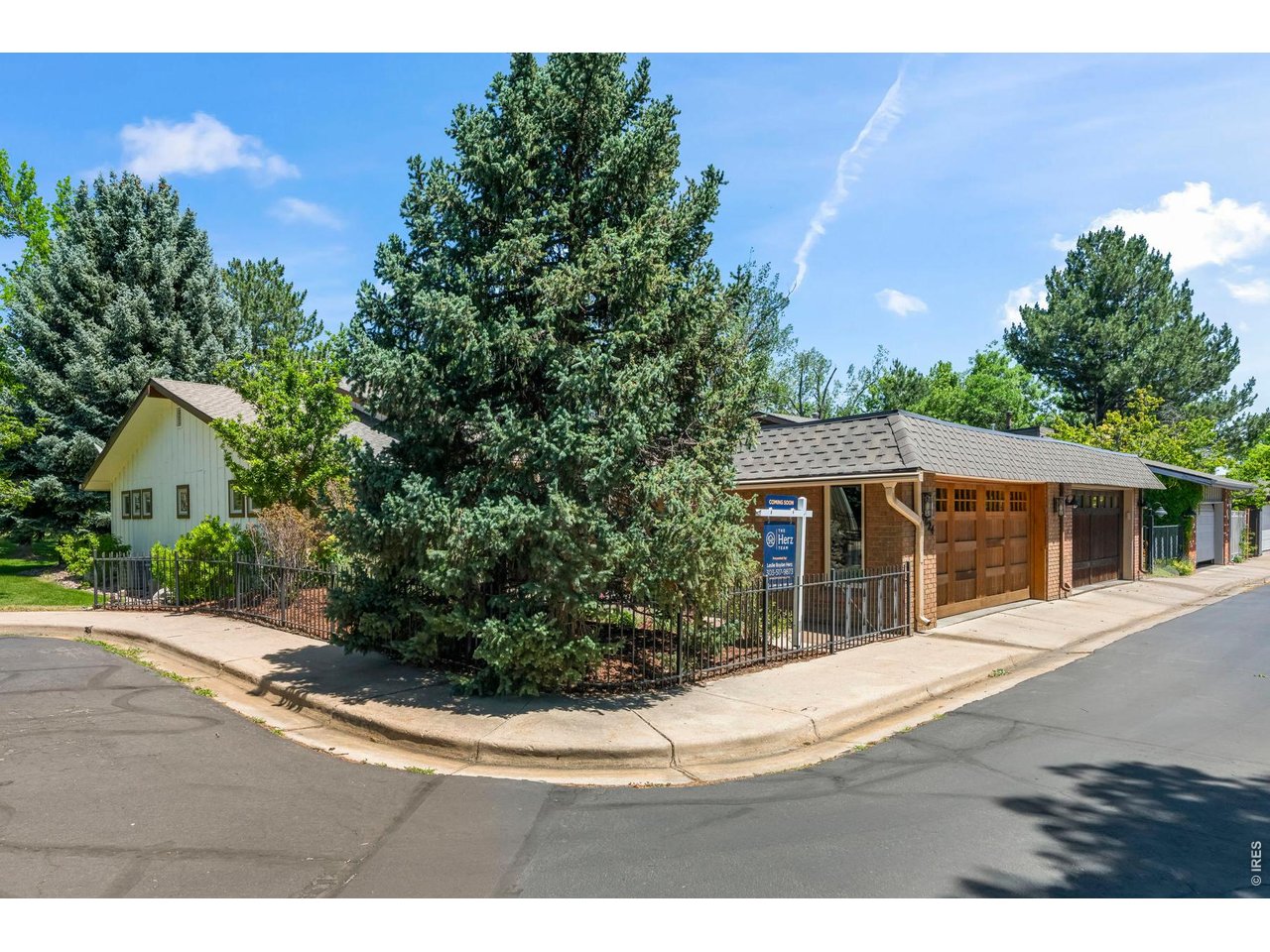 4824 Briar Ridge Court Boulder, CO 80301 - Photo 40 of 40 a view of a house with a backyard