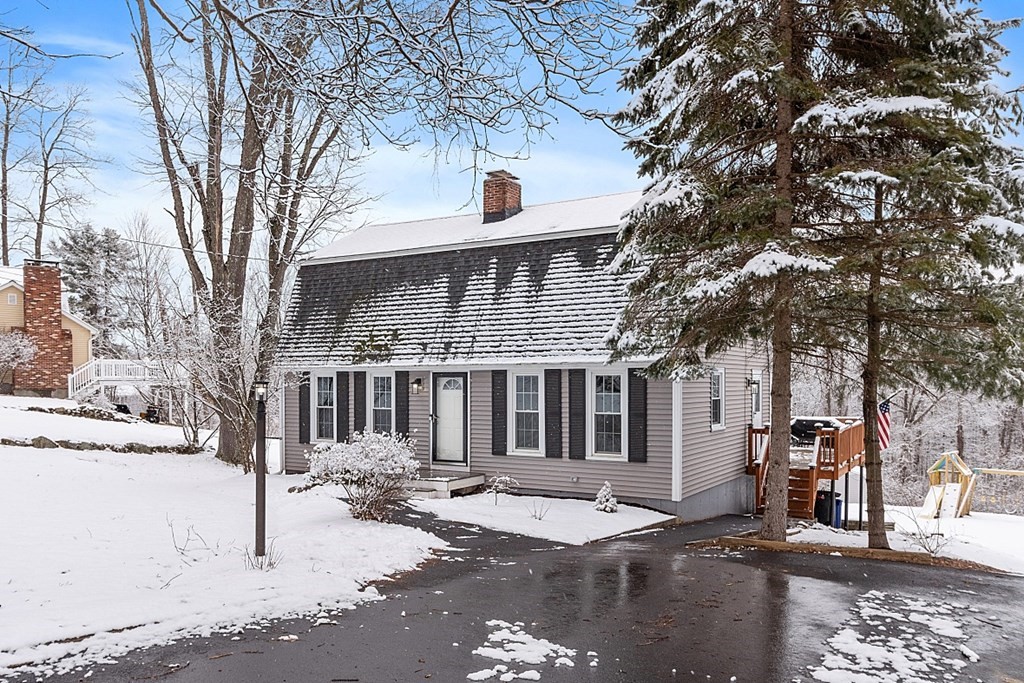 75 Stark Road Derry, NH 03038 - Photo 1 of 39 a front view of a house with a yard