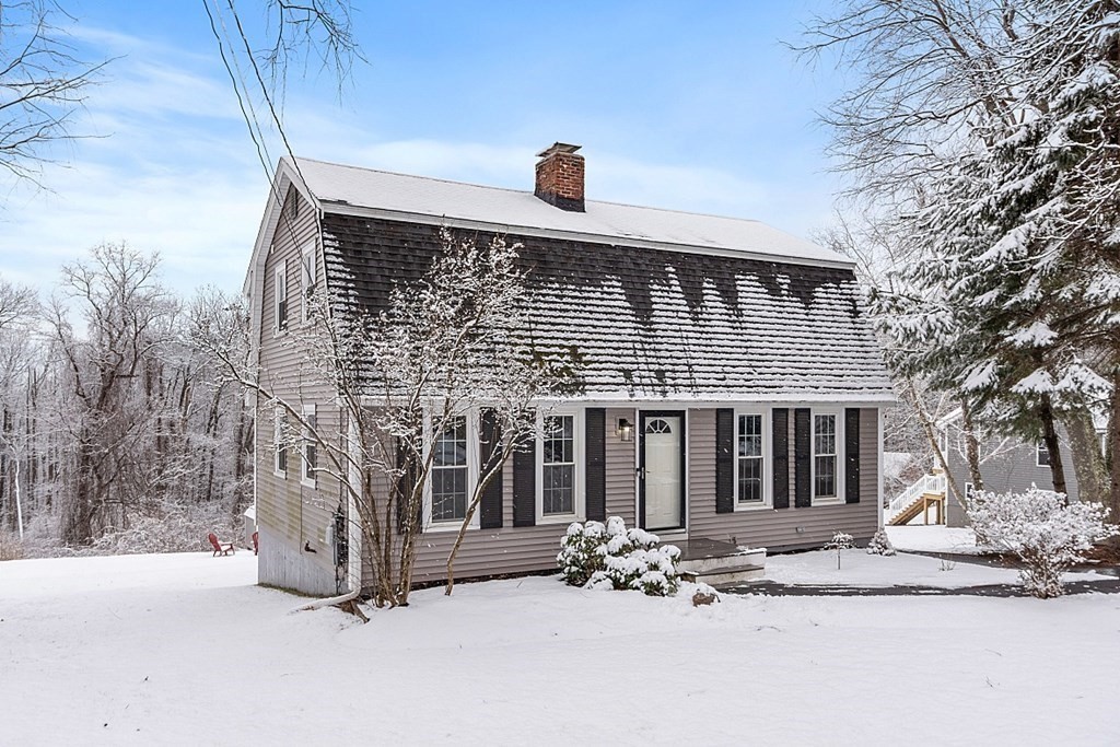75 Stark Road Derry, NH 03038 - Photo 31 of 39 a front view of a house with a yard