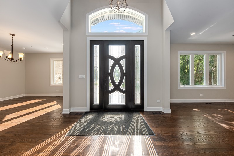 5700 Wolf Road Western Springs, IL 60558 - Photo 2 of 39 a view of an entryway with wooden floor and door