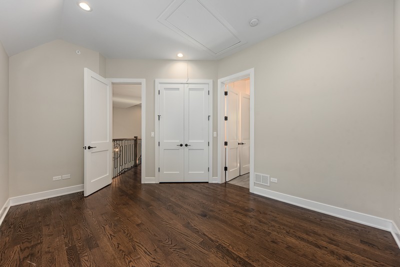 5700 Wolf Road Western Springs, IL 60558 - Photo 31 of 39 a view of an empty room with wooden floor