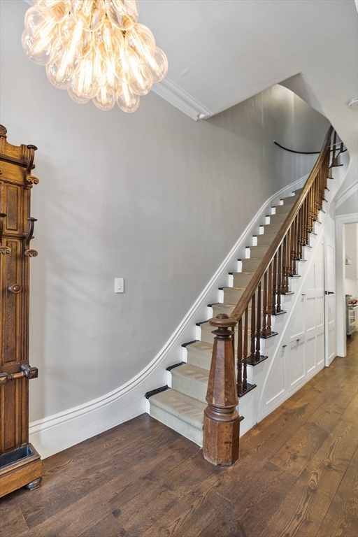 93 Third Street, Unit 93 Cambridge, MA 02141 - Photo 17 of 42 a view of entryway and hall with wooden floor