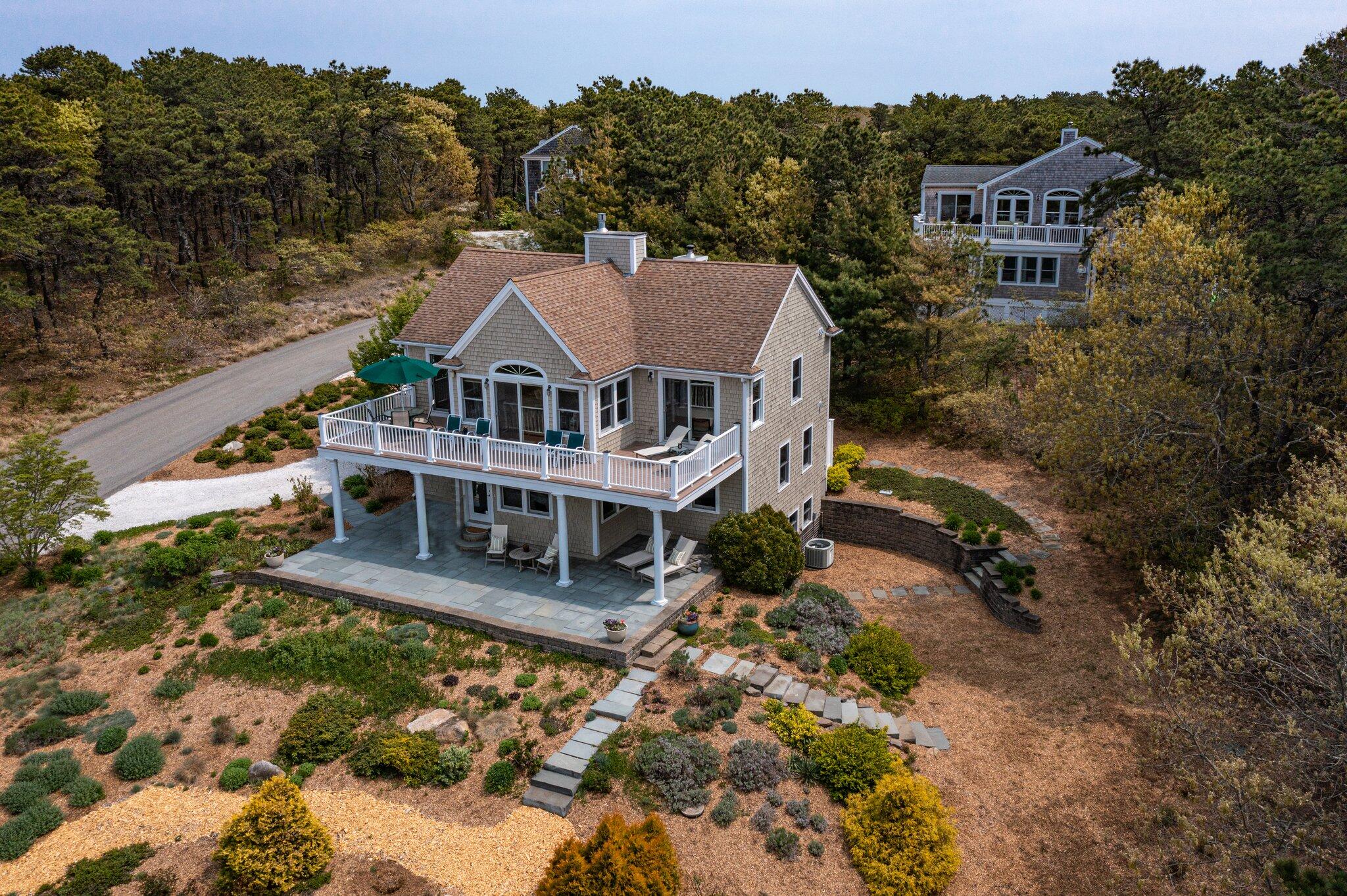 8 Short Lots Lane Truro, MA 02666 - Photo 1 of 76 an aerial view of a house with a garden