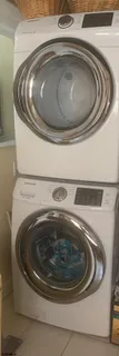 a utility room with washing machine