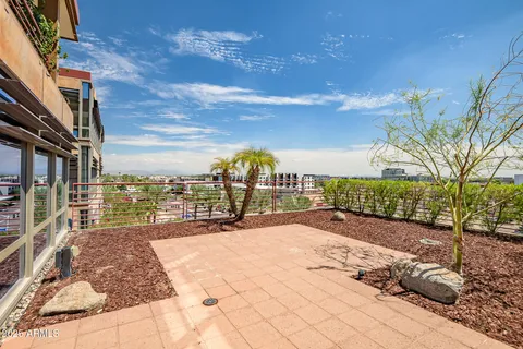 a view of a pathway with a yard