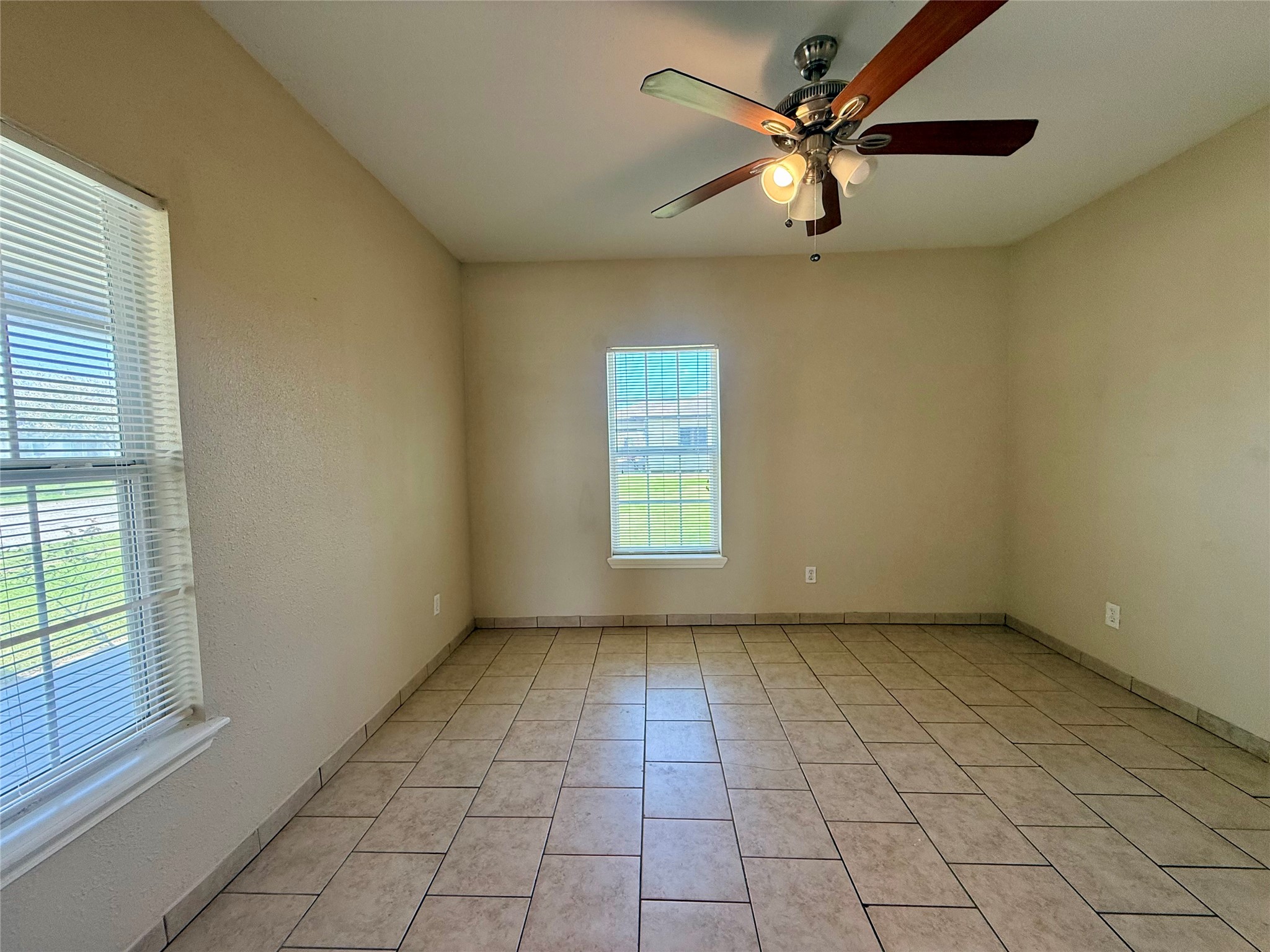 429 West 2nd Street Freeport, TX 77541 - Photo 12 of 49 a view of an empty room with a window