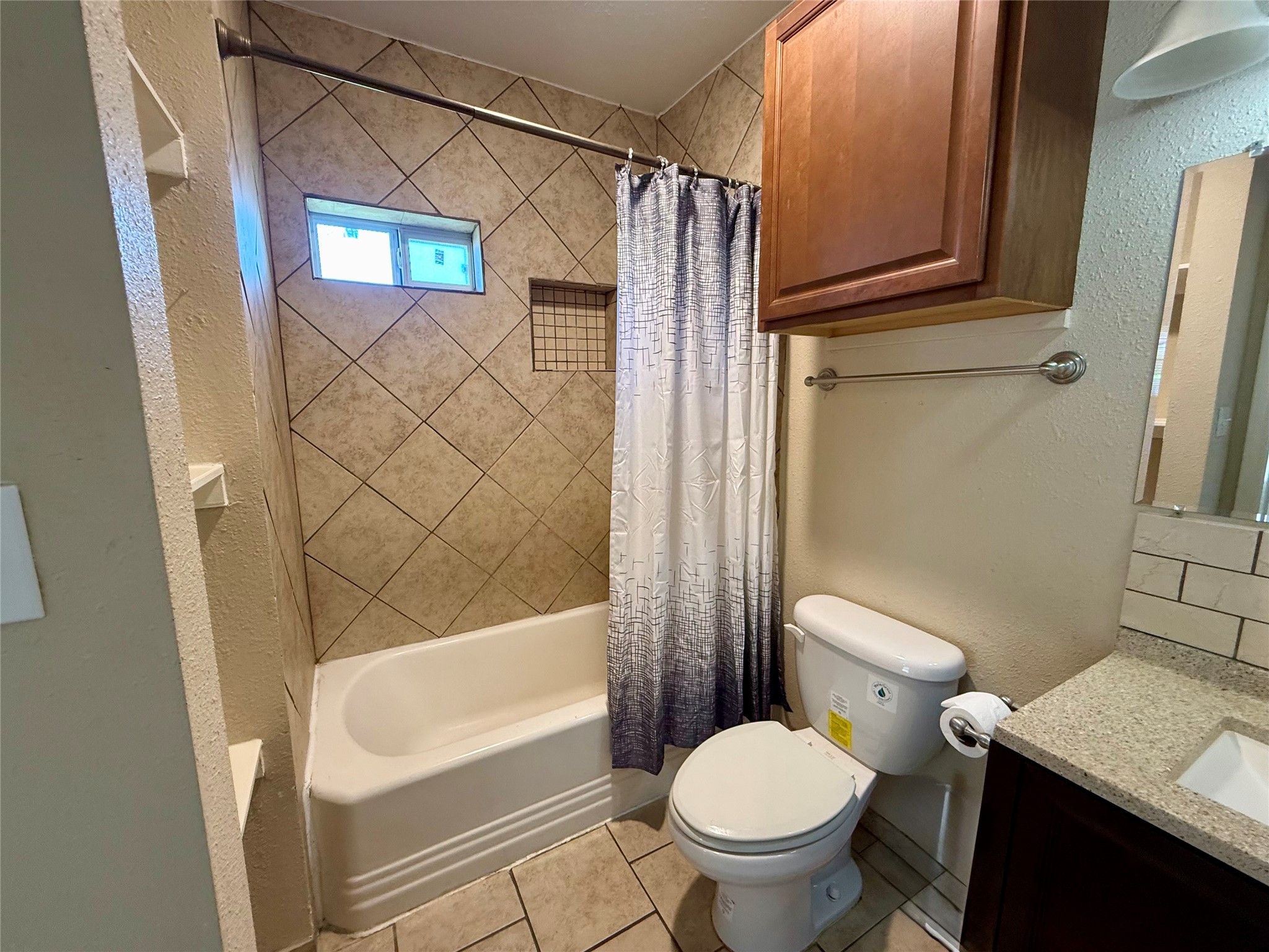 429 West 2nd Street Freeport, TX 77541 - Photo 16 of 49 a bathroom with a toilet and a shower
