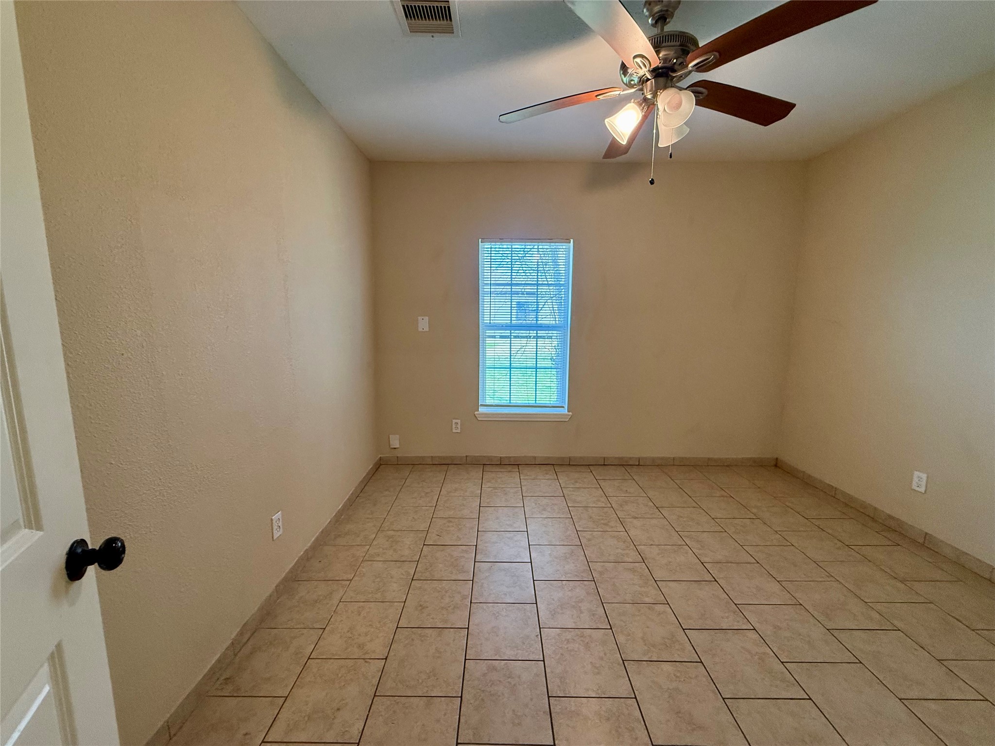 429 West 2nd Street Freeport, TX 77541 - Photo 20 of 49 a view of an empty room with a window