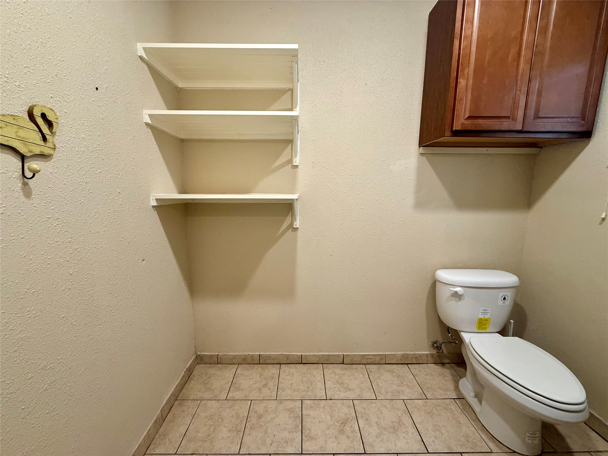 429 West 2nd Street Freeport, TX 77541 - Photo 24 of 49 a bathroom with a toilet