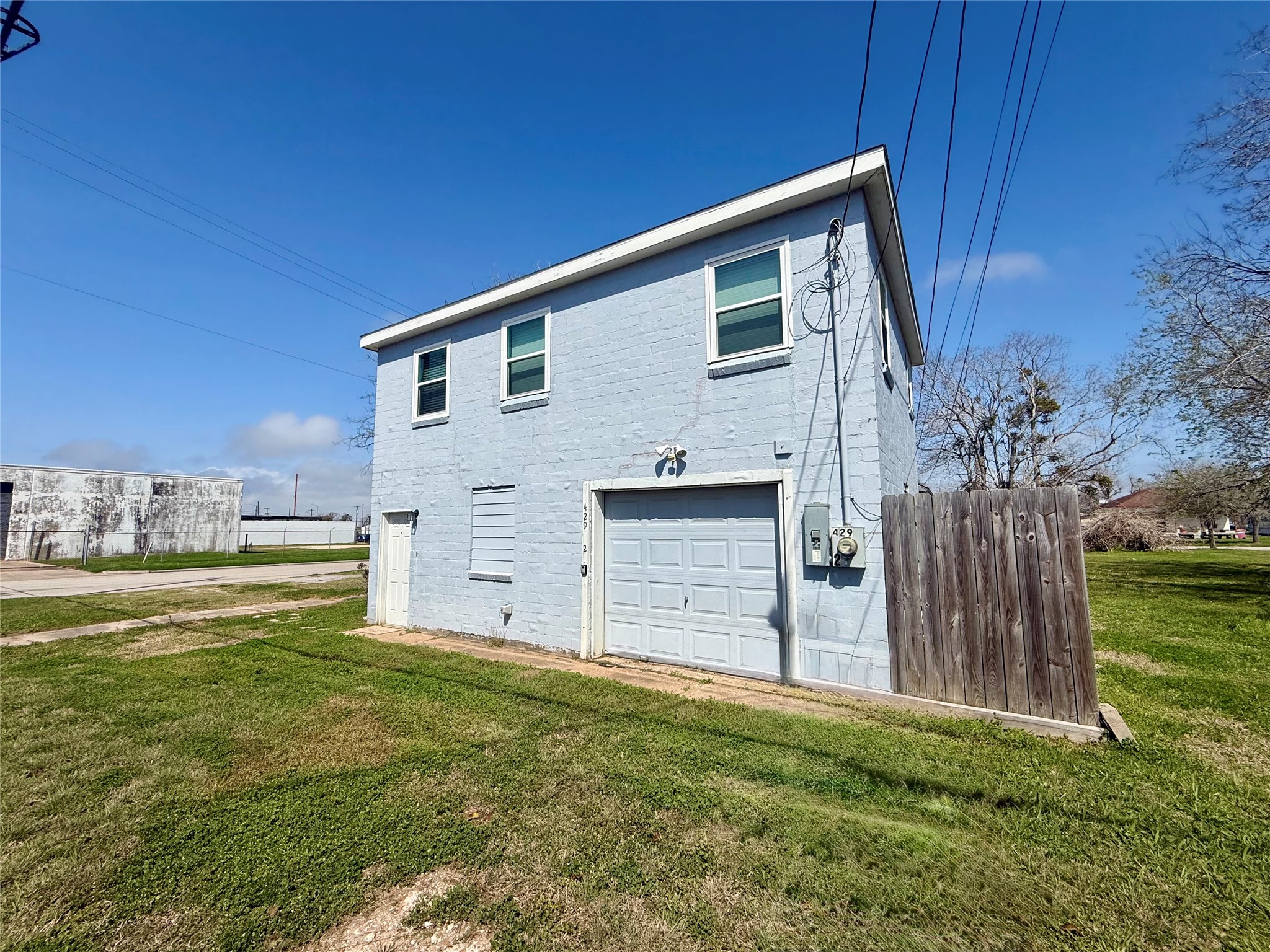 429 West 2nd Street Freeport, TX 77541 - Photo 4 of 49 a view of a backyard of the house