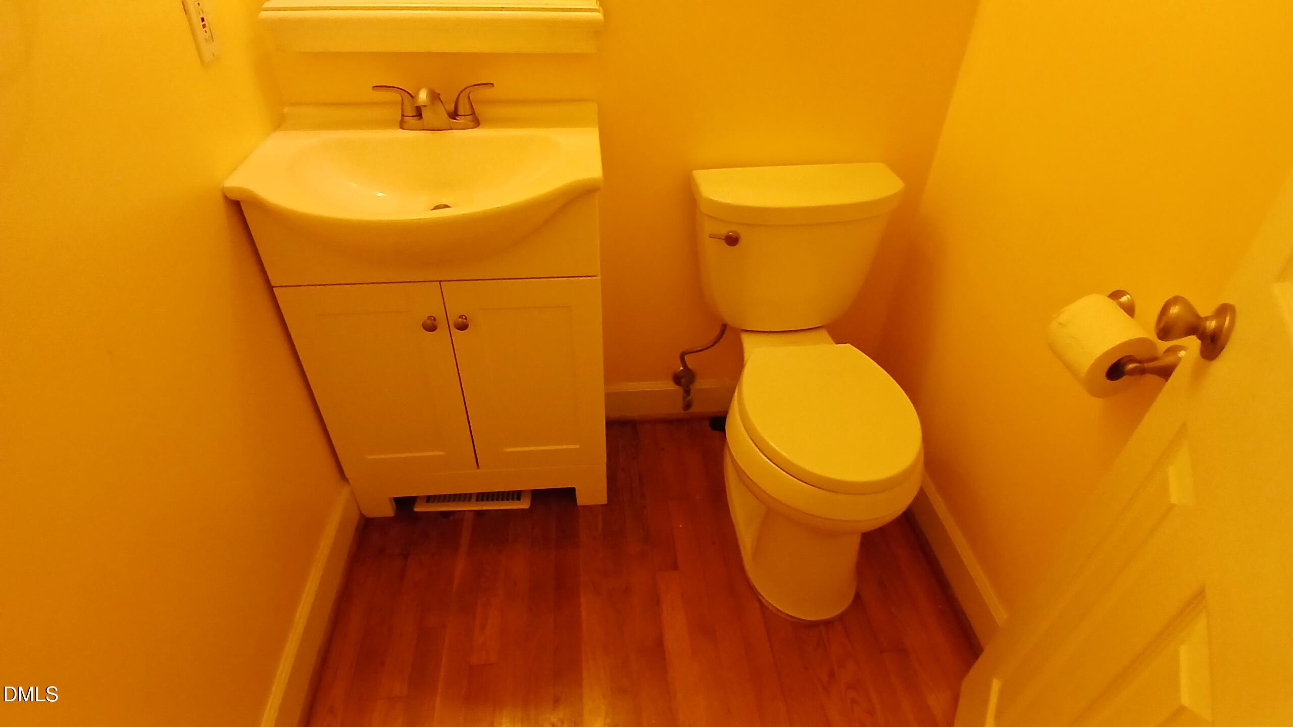 1817 Thorpshire Drive Raleigh, NC 27615 - Photo 16 of 36 a bathroom with a toilet and a sink