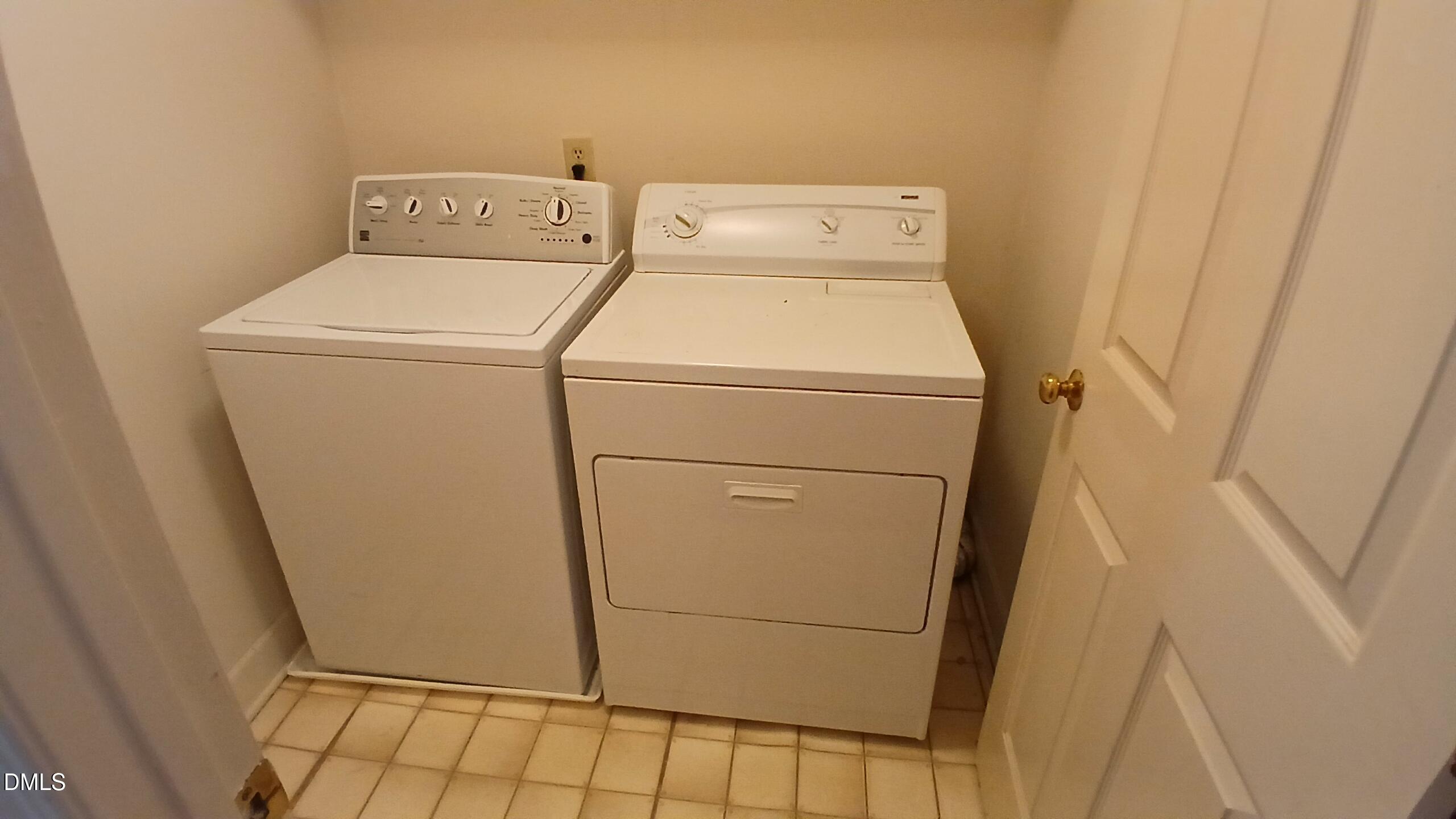 1817 Thorpshire Drive Raleigh, NC 27615 - Photo 30 of 36 a utility room with dryer and washer