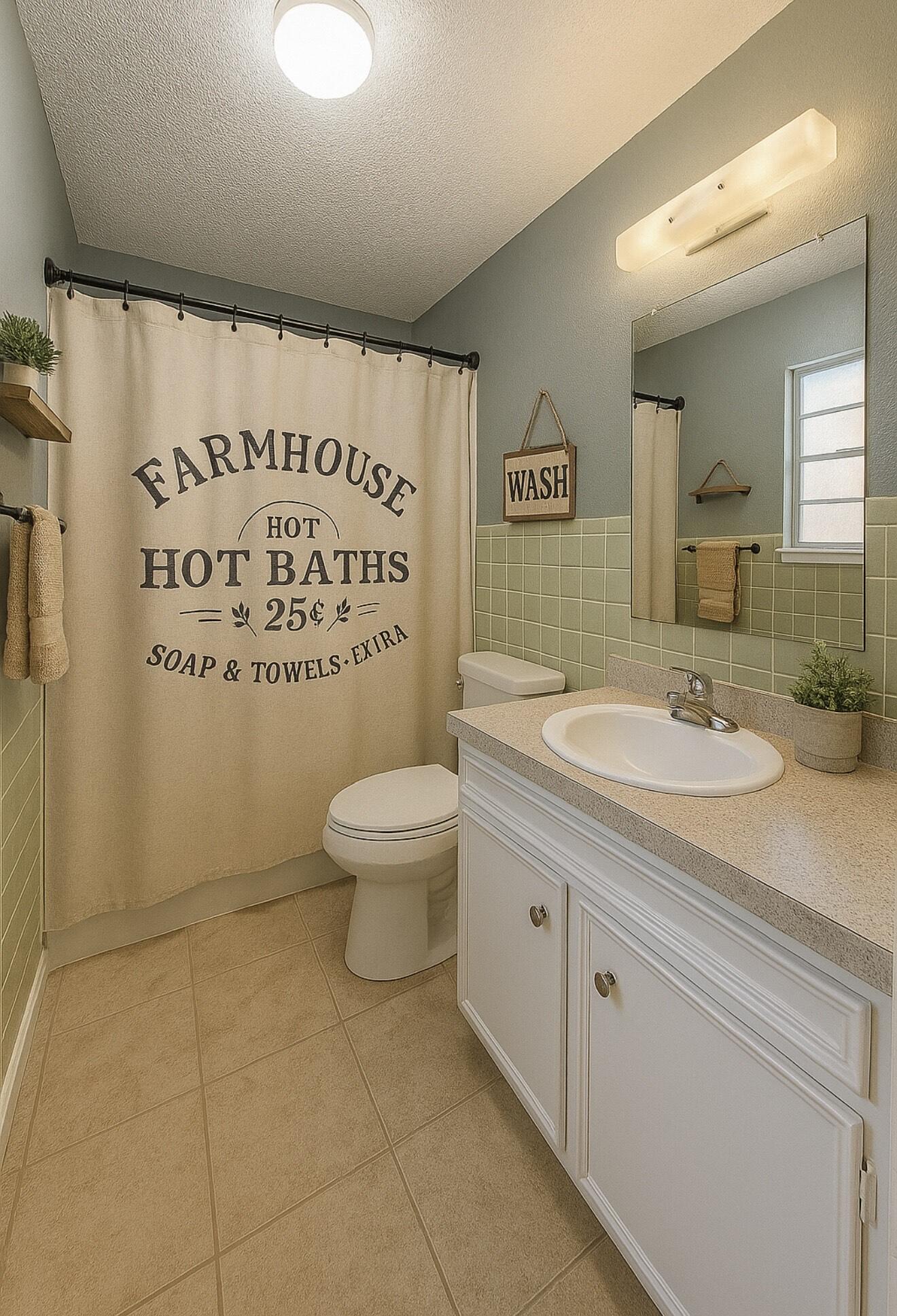5405 49th Street Lubbock, TX 79414 - Photo 20 of 25 a bathroom with a sink toilet and shower