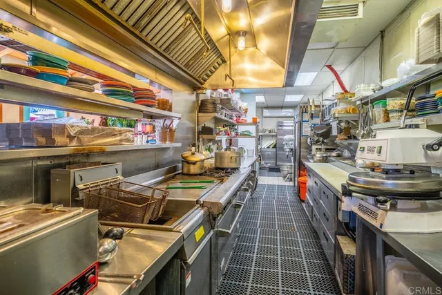 an aerial view of residential house with parking space