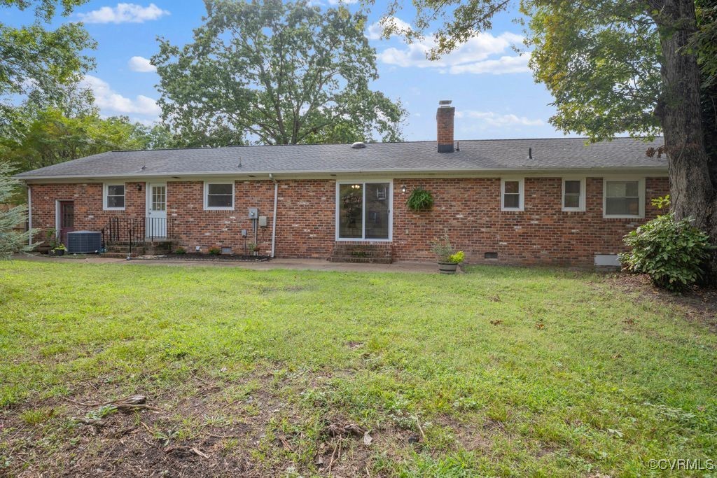 11511 Rochelle Road Chester, VA 23831 - Photo 12 of 32 front view of a house with a yard