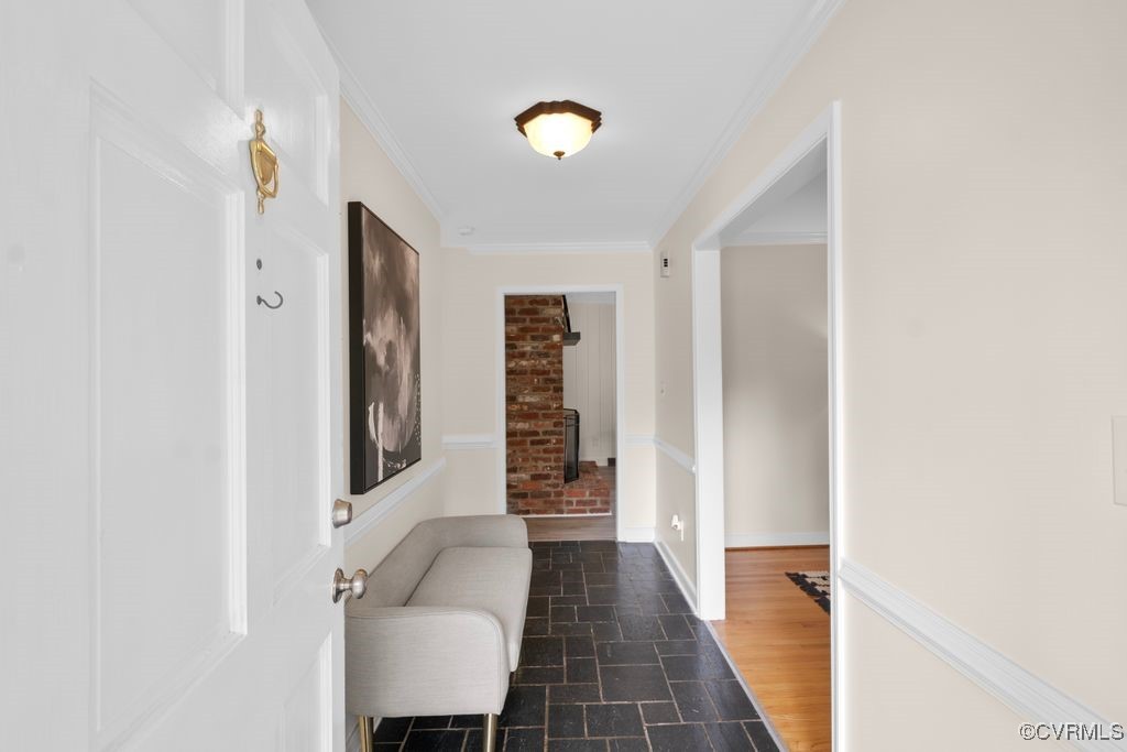 11511 Rochelle Road Chester, VA 23831 - Photo 13 of 32 a view of a hallway with paintings on the wall