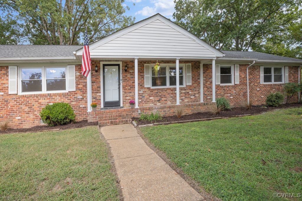 11511 Rochelle Road Chester, VA 23831 - Photo 4 of 32 front view of a house and a yard