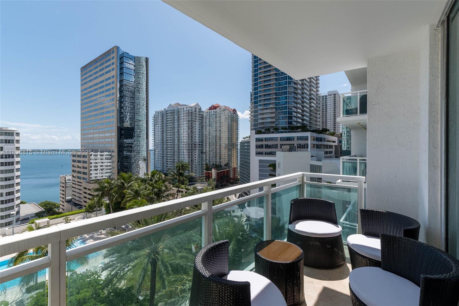 951 Brickell Avenue, Unit 1606 Miami, FL 33131 - Photo 25 of 30 a balcony view with two chairs and a table