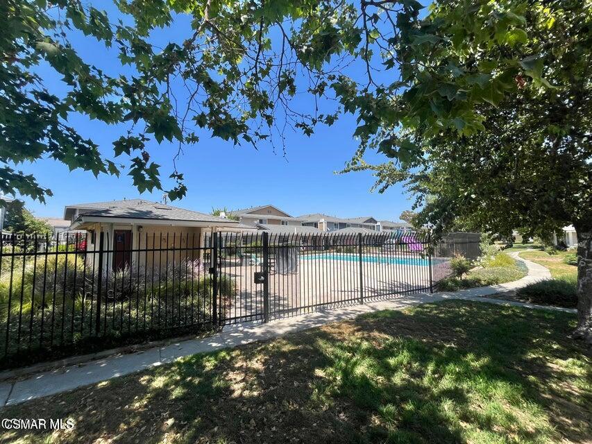 540 Spring Road, Unit 94 Moorpark, CA 93021 - Photo 20 of 22 a view of a wrought iron fence