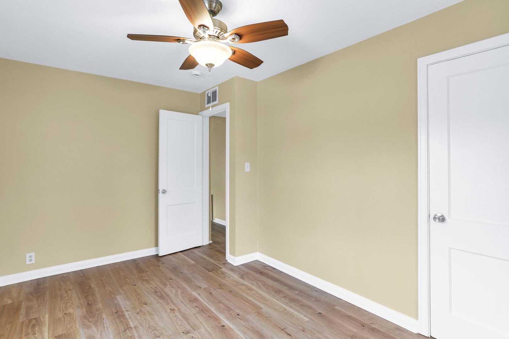 15 Gerald Road Rantoul, IL 61866 - Photo 14 of 19 a view of an empty room with wooden floor