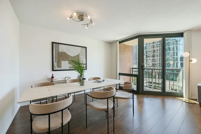 a view of a livingroom with furniture and wooden floor