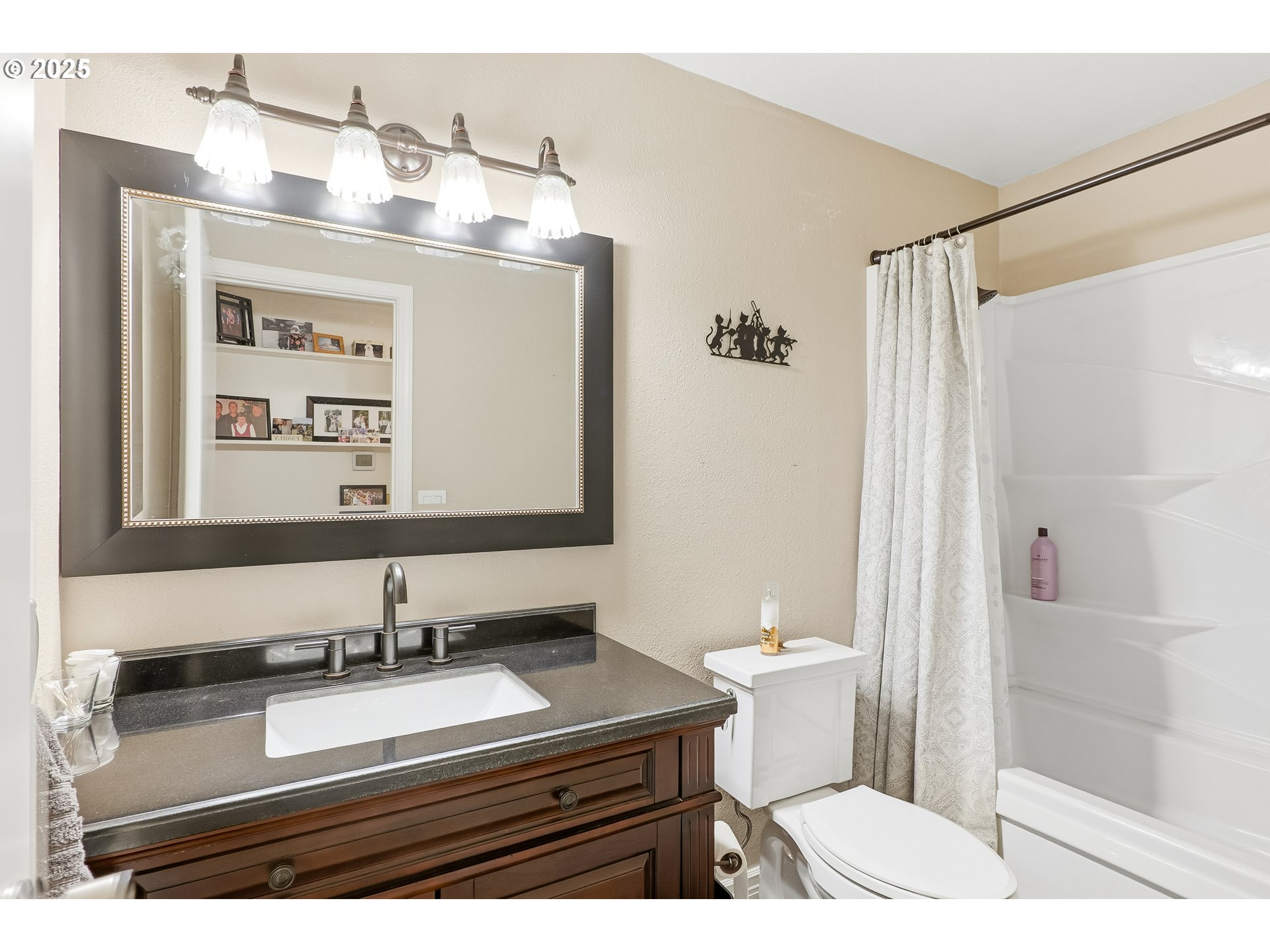 2185 Southwest 9th Court Gresham, OR 97080 - Photo 12 of 28 a bathroom with a sink a toilet and shower