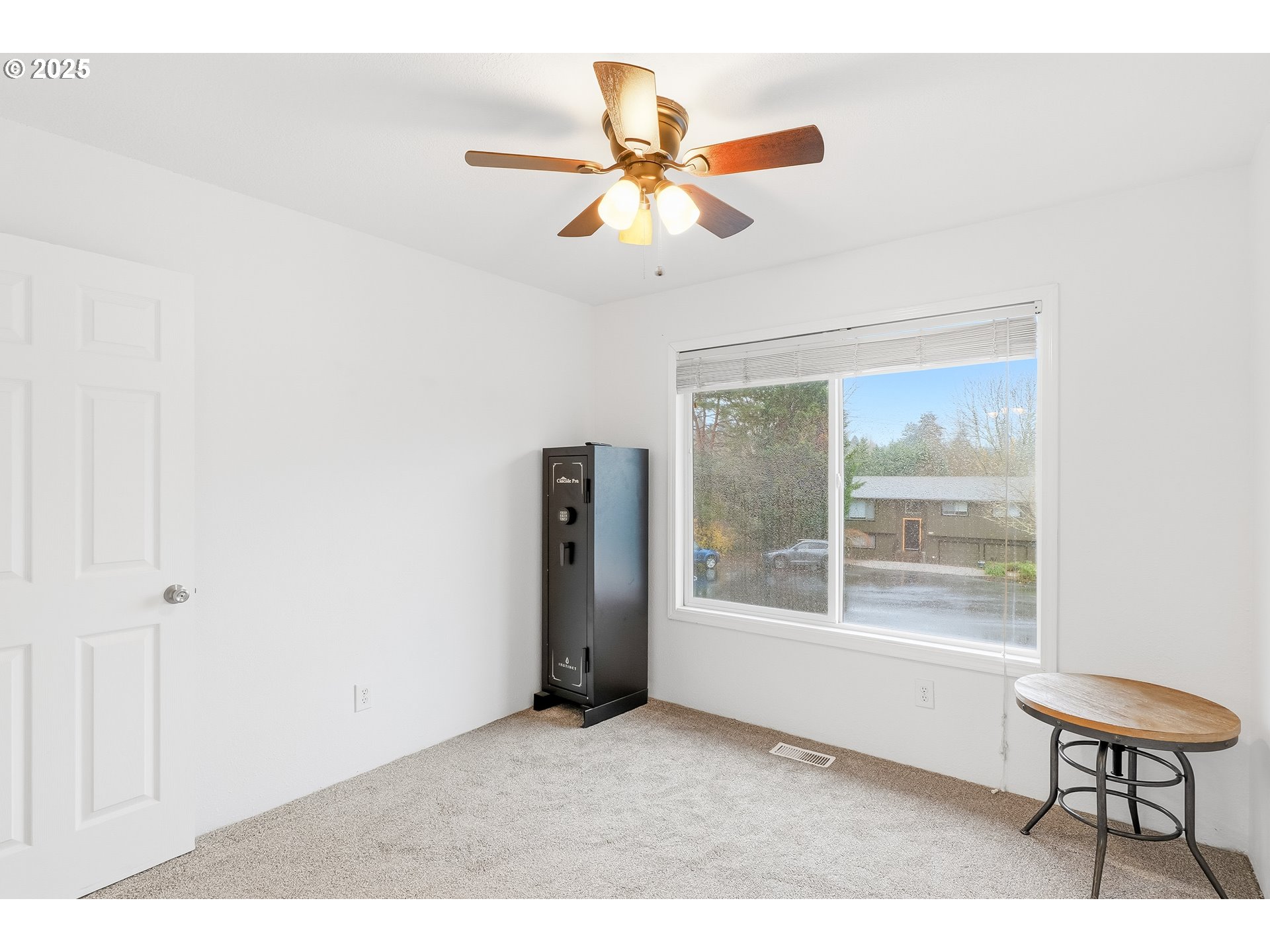 2185 Southwest 9th Court Gresham, OR 97080 - Photo 14 of 28 a view of a livingroom with furniture and a window