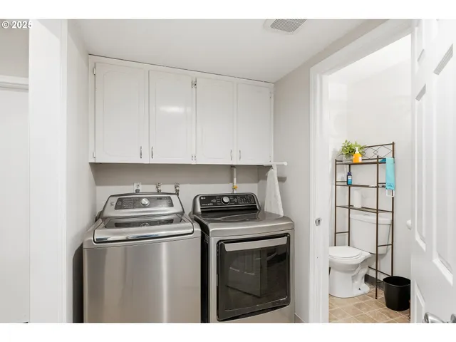a kitchen with a stove and a cabinet