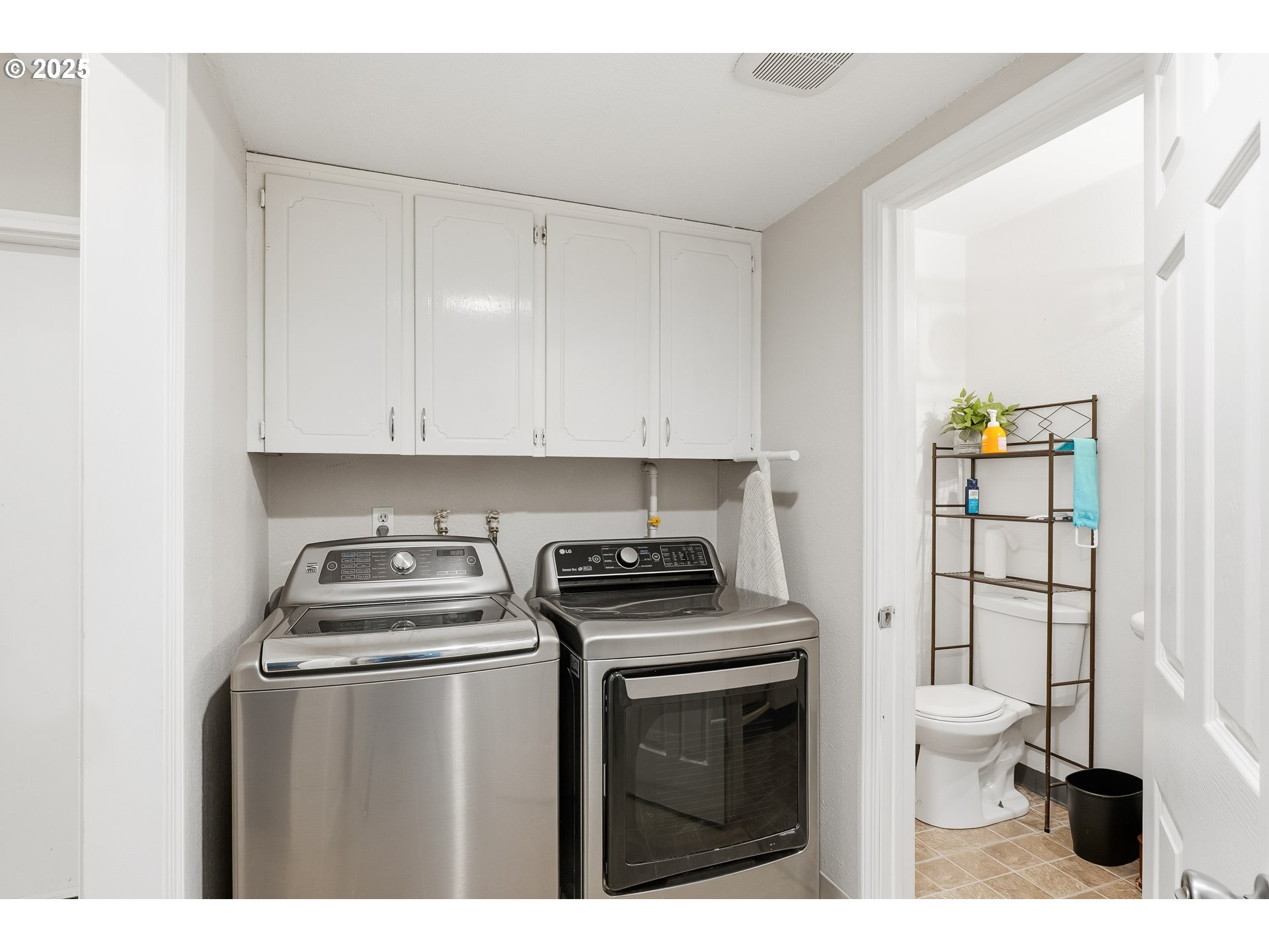 2185 Southwest 9th Court Gresham, OR 97080 - Photo 15 of 28 a kitchen with a stove and a cabinet