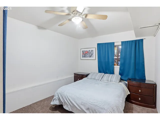 a bedroom with a bed and a closet