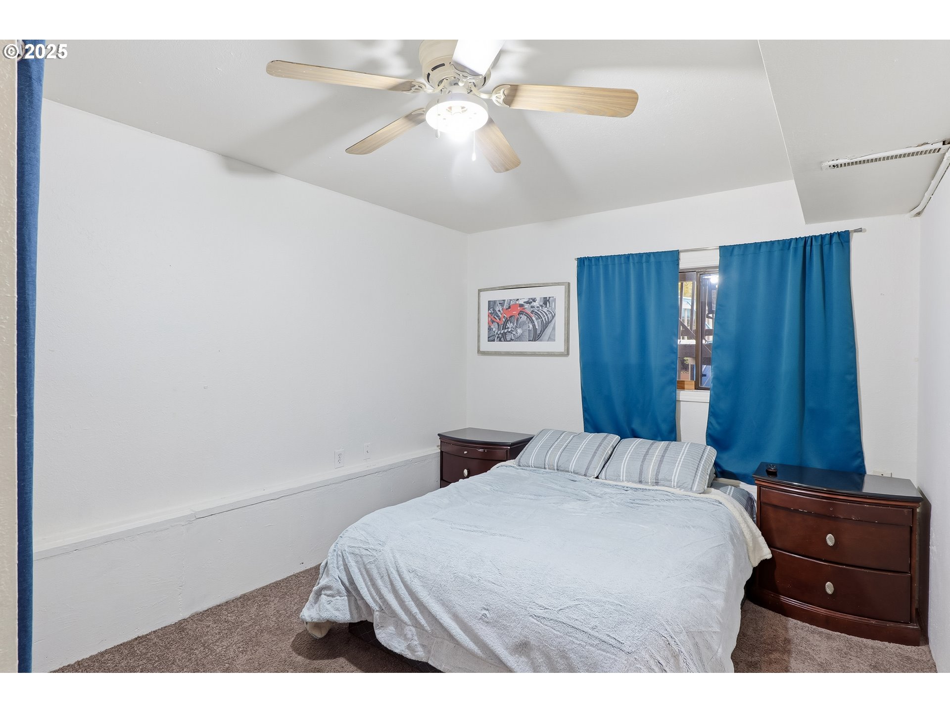 2185 Southwest 9th Court Gresham, OR 97080 - Photo 17 of 28 a bedroom with a bed and a closet
