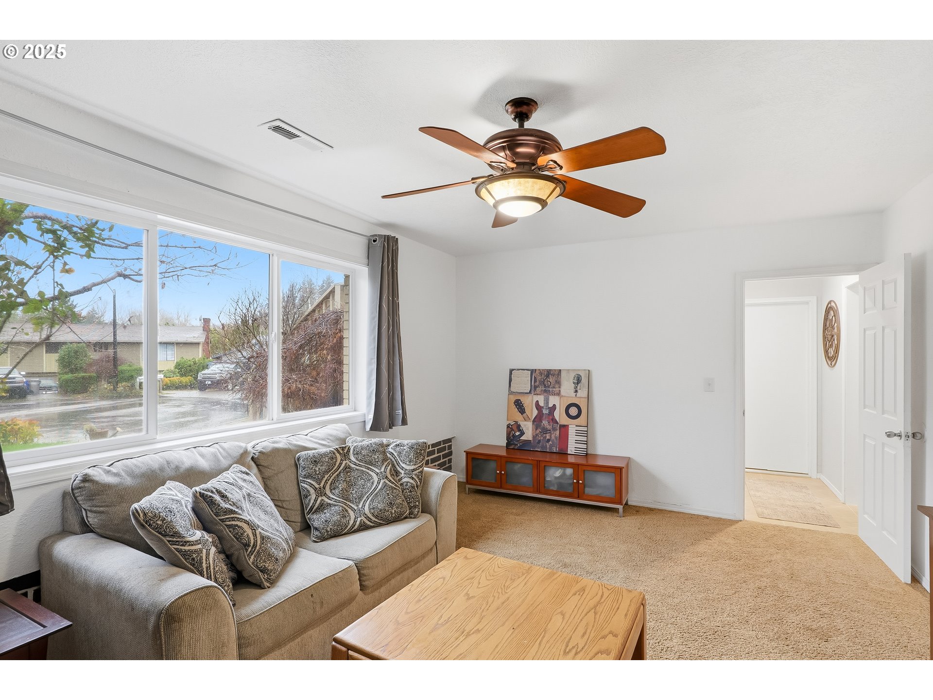 2185 Southwest 9th Court Gresham, OR 97080 - Photo 19 of 28 a living room with furniture and a large window
