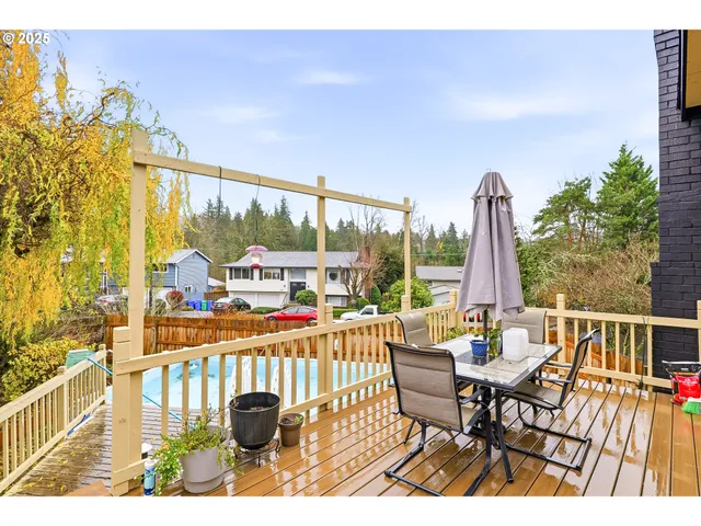 a view of balcony with couch and outdoor seating