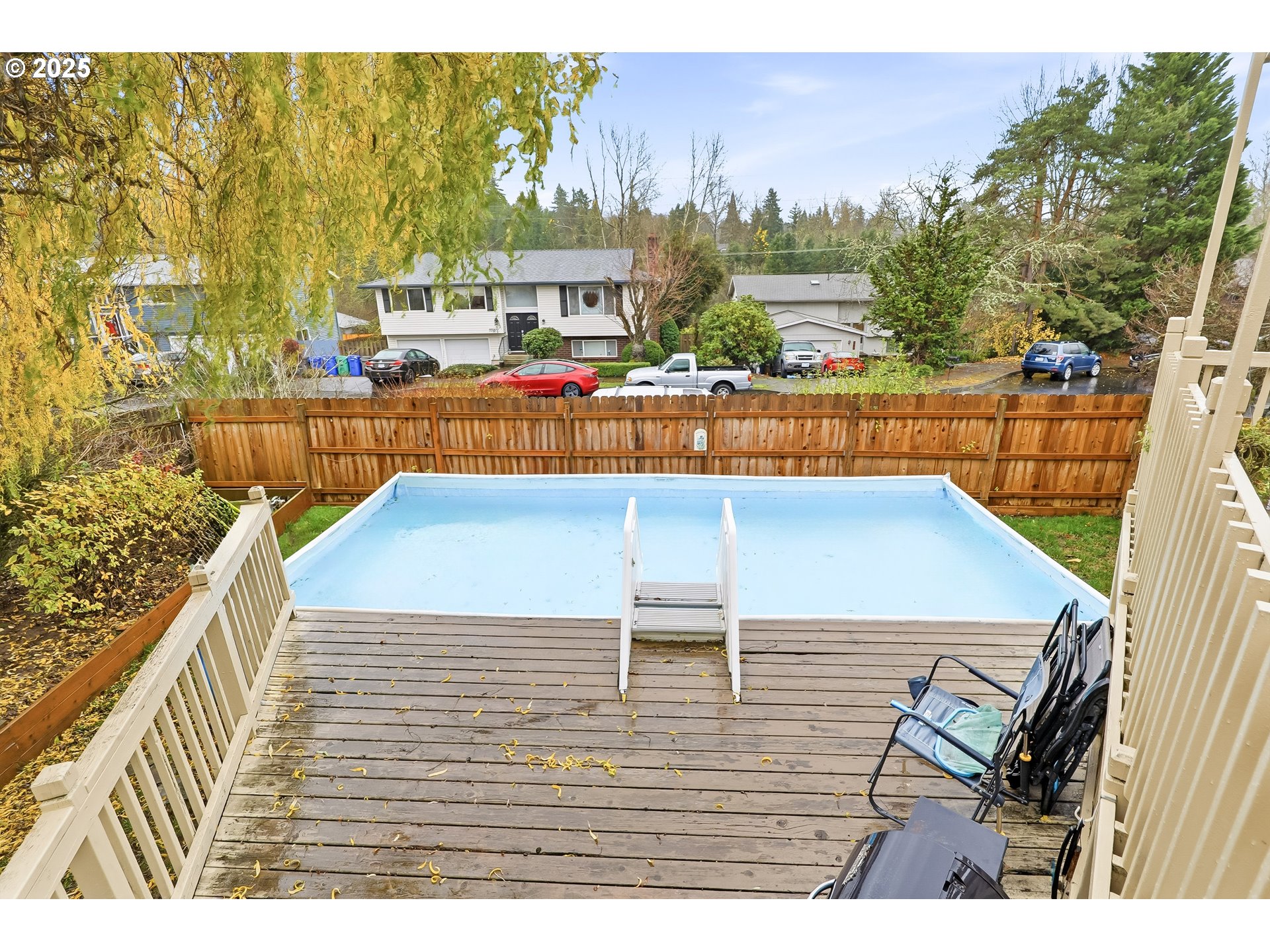 2185 Southwest 9th Court Gresham, OR 97080 - Photo 26 of 28 a view of a balcony with wooden floor and city view