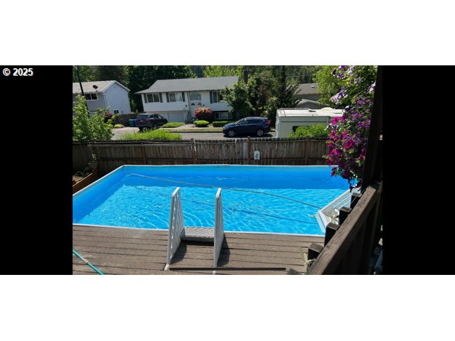 2185 Southwest 9th Court Gresham, OR 97080 - Photo 28 of 28 a view of swimming pool with seating space