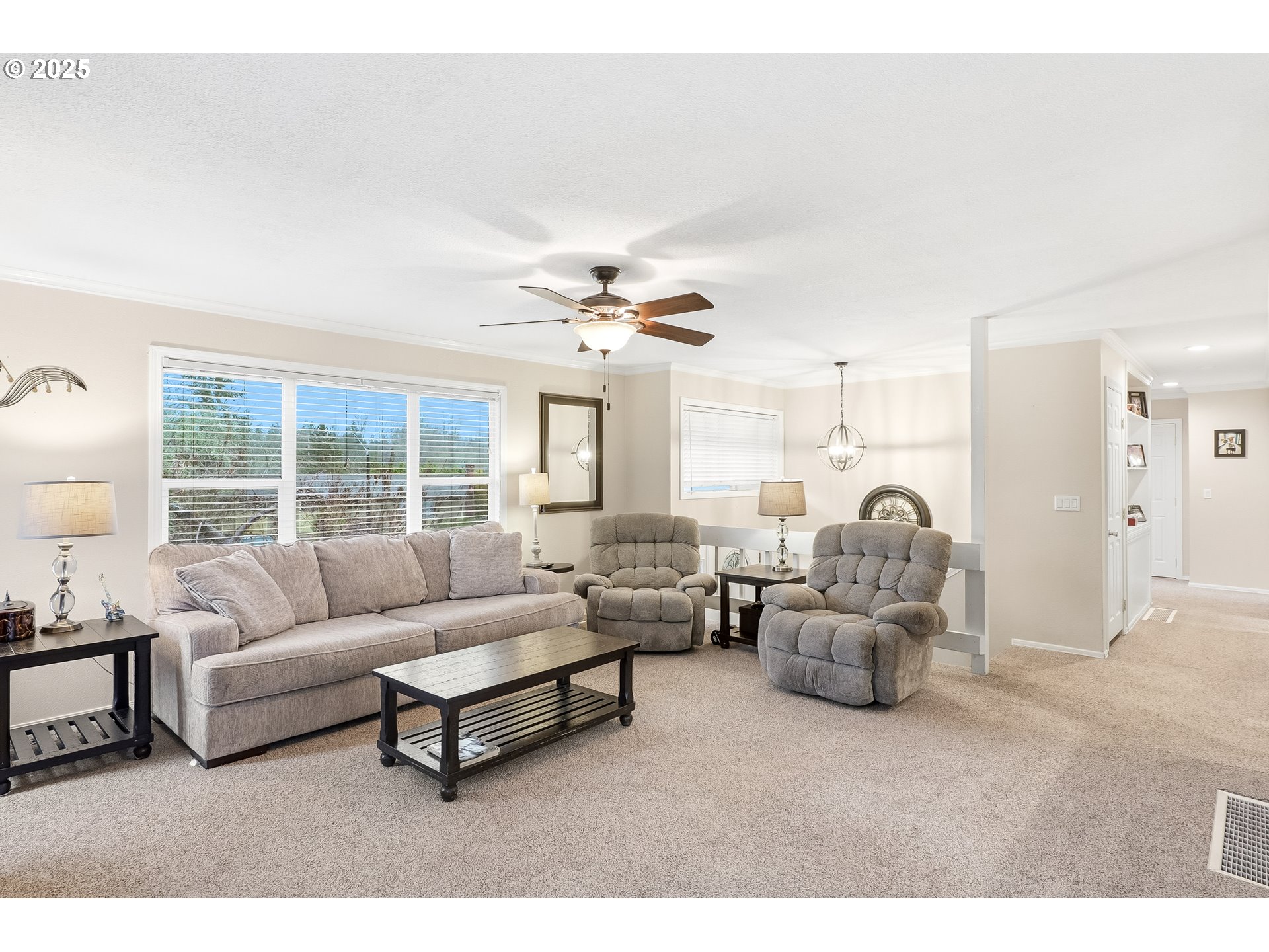2185 Southwest 9th Court Gresham, OR 97080 - Photo 5 of 28 a living room with furniture and a large window
