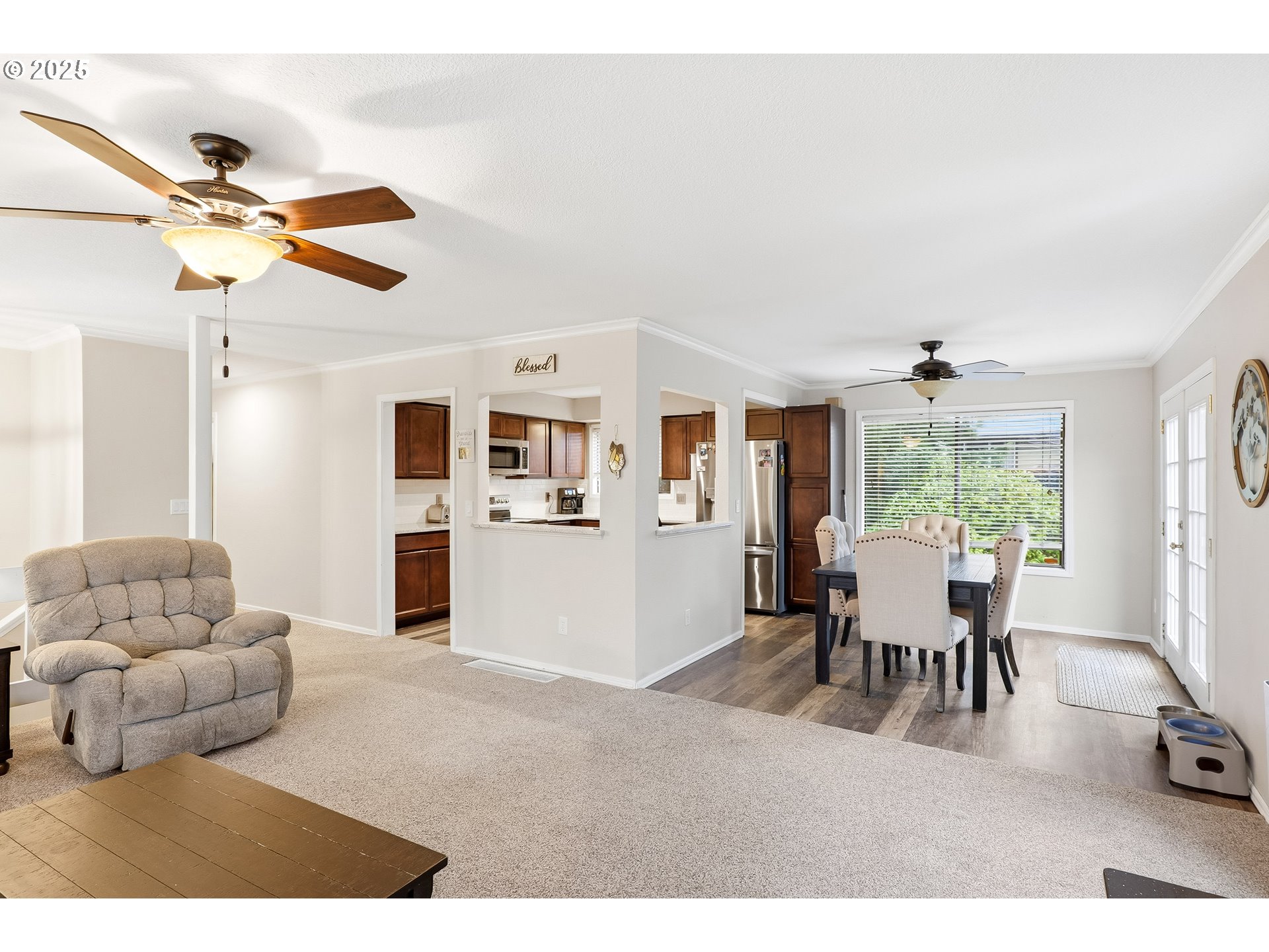 2185 Southwest 9th Court Gresham, OR 97080 - Photo 6 of 28 a living room with furniture and a large window