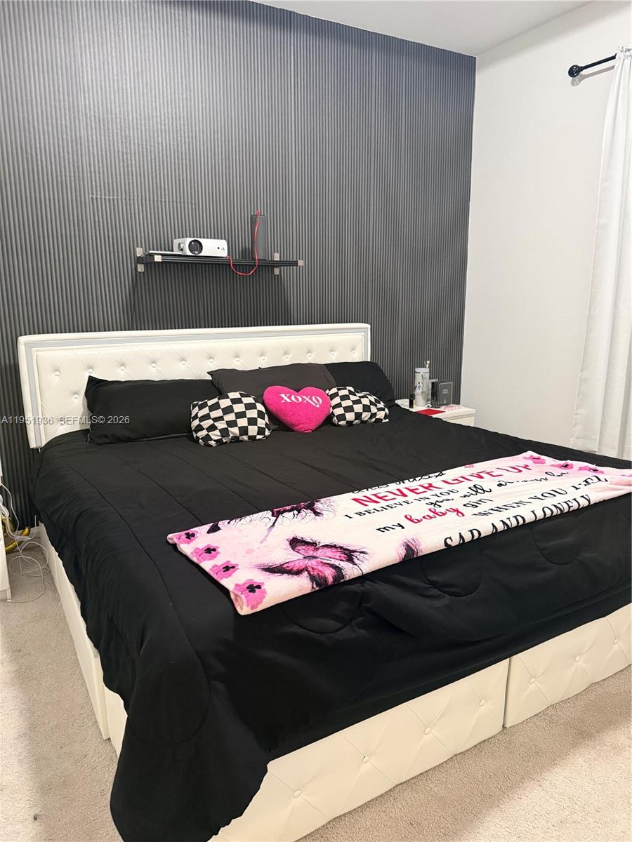 29224 Southwest 162nd Avenue Homestead, FL 33033 - Photo 19 of 26 a bathroom with a bathtub