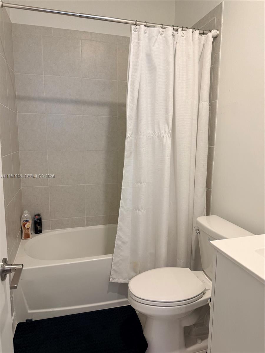 29224 Southwest 162nd Avenue Homestead, FL 33033 - Photo 25 of 26 a bathroom with a sink and a toilet