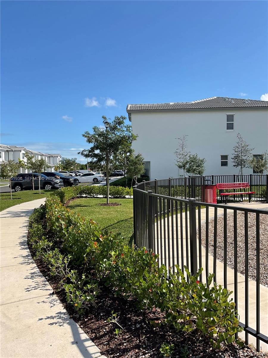 29224 Southwest 162nd Avenue Homestead, FL 33033 - Photo 4 of 26 a view of a backyard with garden