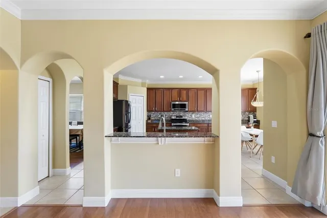 a view of a living room with a wooden floor