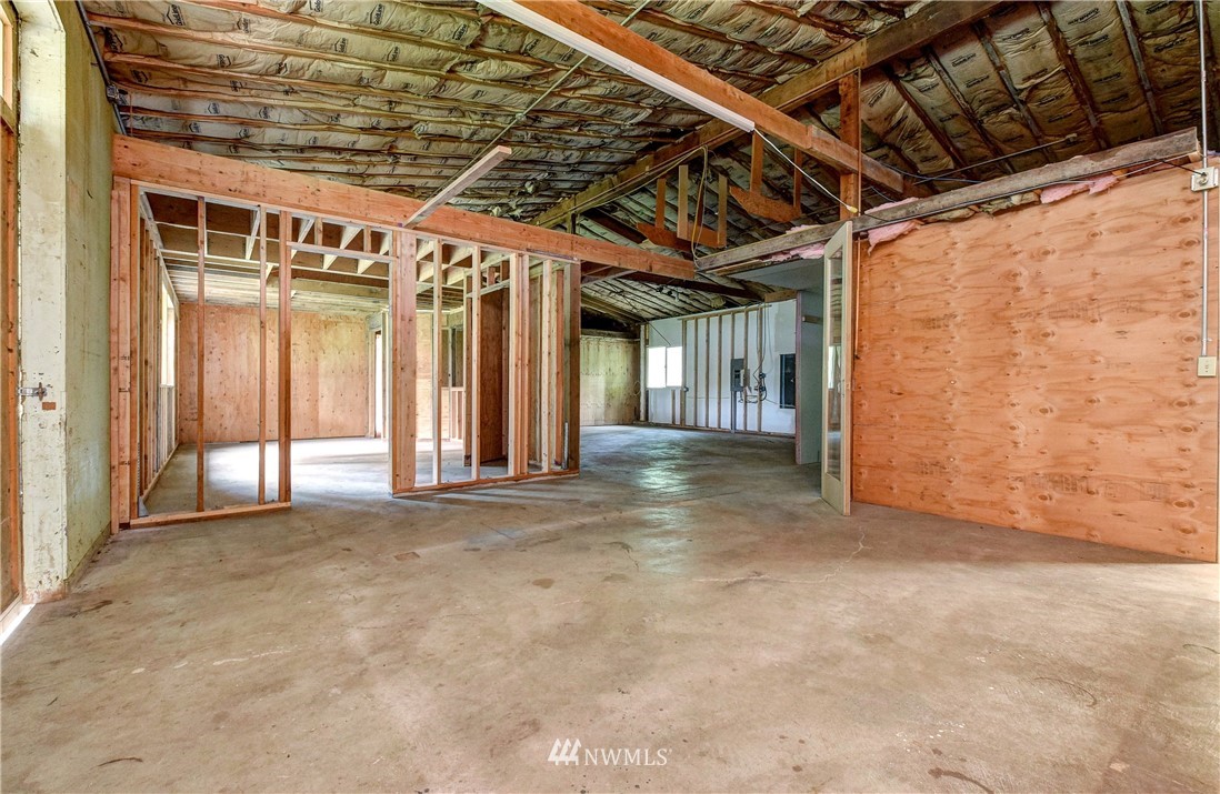 23507 49th Avenue Southeast Bothell, WA 98021 - Photo 12 of 25 a view of a room with wooden walls