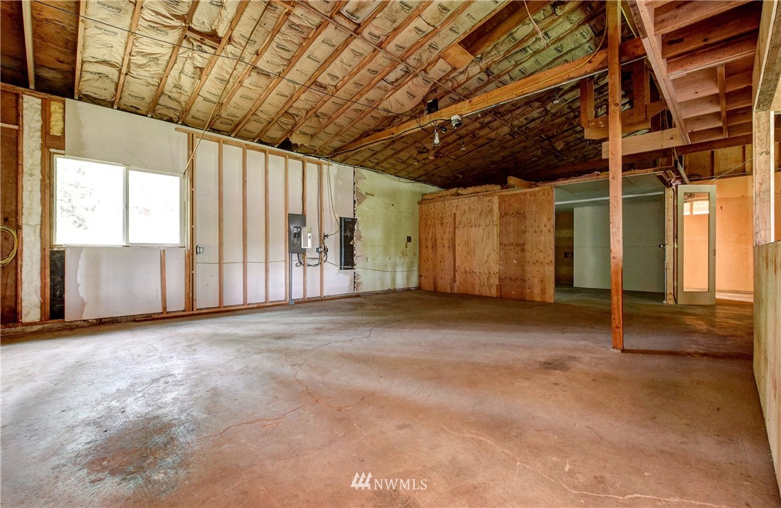 23507 49th Avenue Southeast Bothell, WA 98021 - Photo 15 of 25 an empty room with windows
