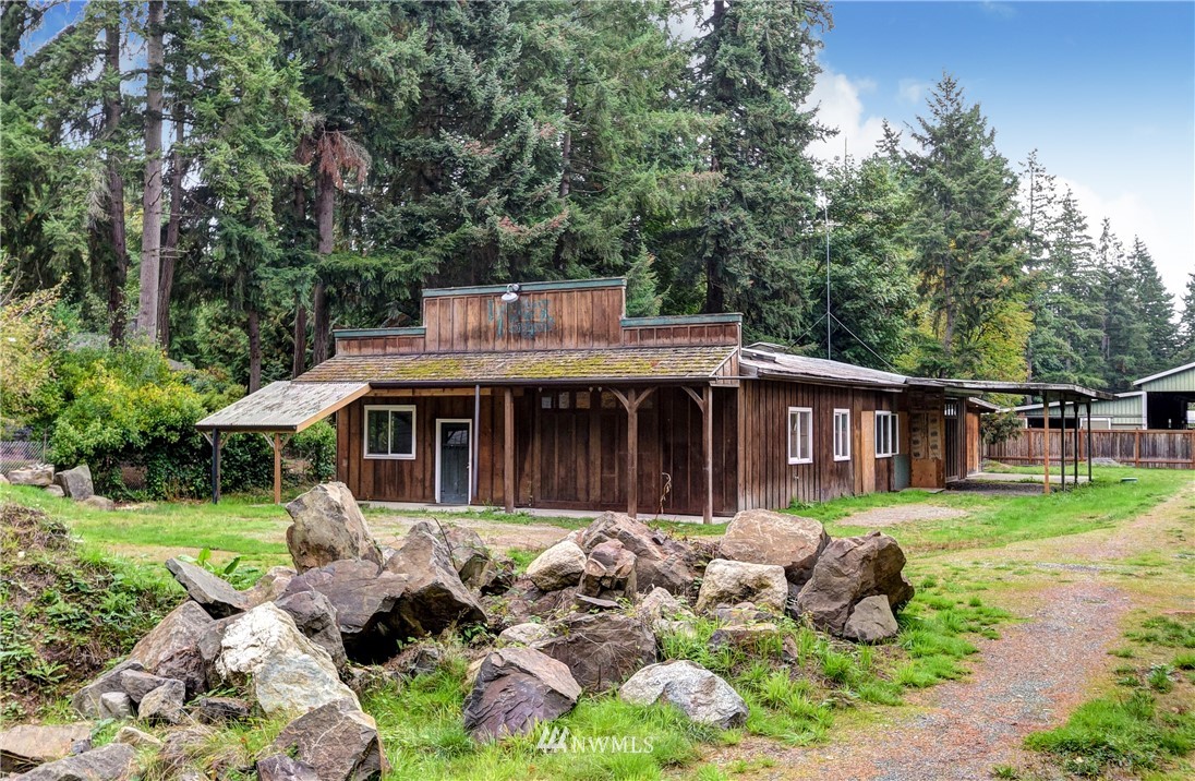 23507 49th Avenue Southeast Bothell, WA 98021 - Photo 21 of 25 a front view of a house with garden