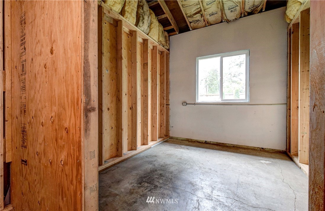 23507 49th Avenue Southeast Bothell, WA 98021 - Photo 8 of 25 a view of an empty room with a window