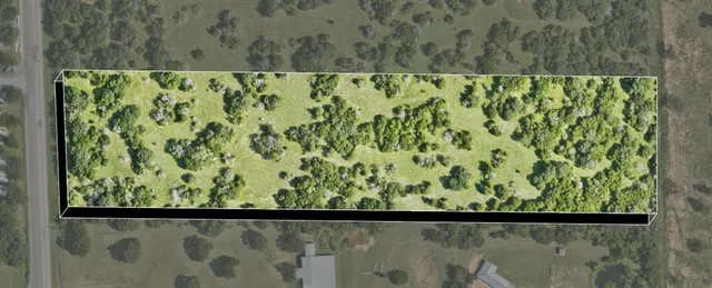 a view of a garden from a balcony