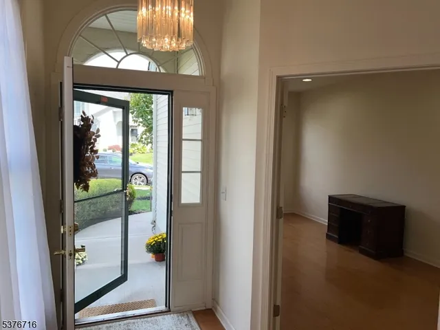 a view of livingroom with furniture and a window