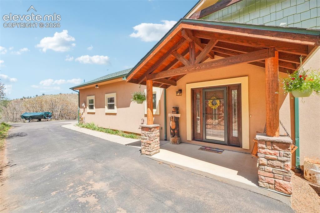 858 Oak Ridge Road Manitou Springs, CO 80829 - Photo 5 of 50 Front entrance/Covered patio