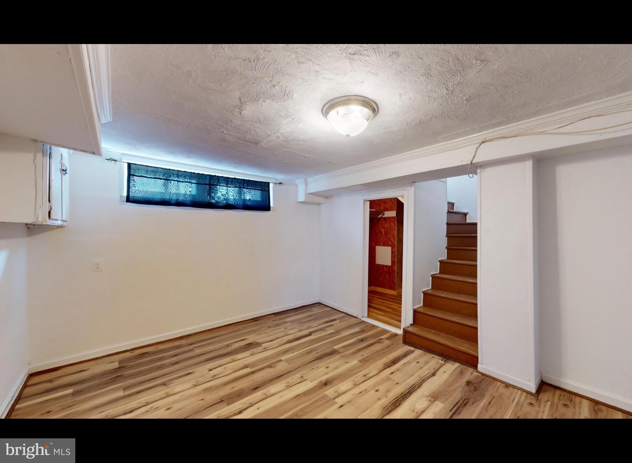 944 1st Street Brooklyn, MD 21225 - Photo 14 of 17 Versatile basement with natural light.