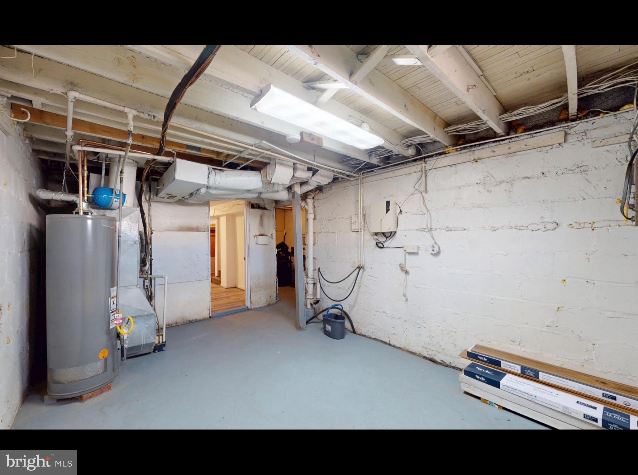 944 1st Street Brooklyn, MD 21225 - Photo 16 of 17 Spacious basement ready for your vision.